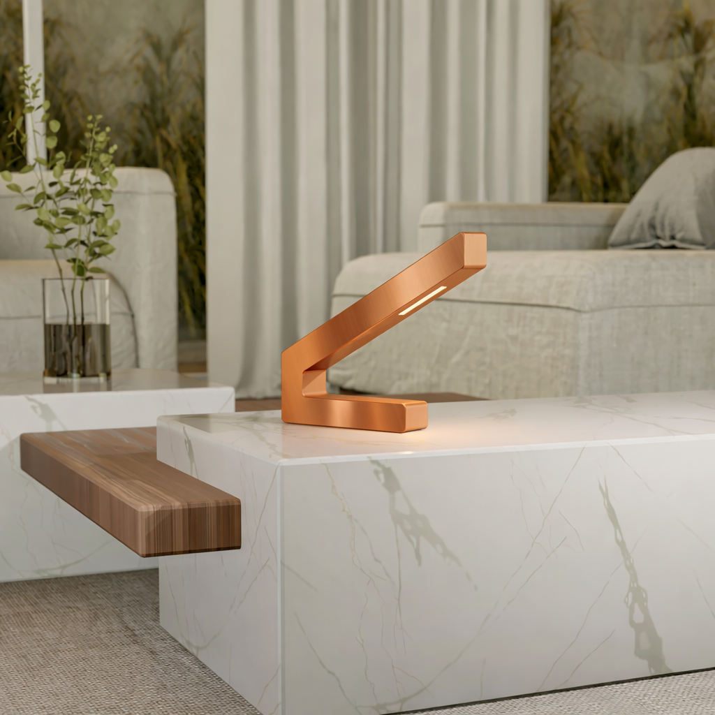 Copper finish modern LED lamp by WOOM, with an angular design, emitting warm light on a marble coffee table with a wooden shelf.