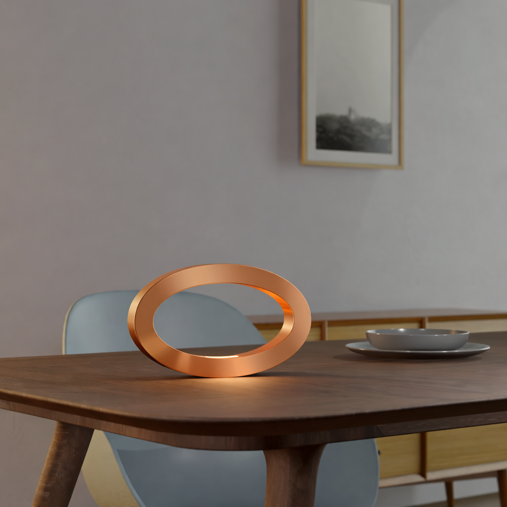 Copper Finish Handcrafted Rotatable Wooden Oval Lamp by WOOM, casting a warm glow on a wooden table.