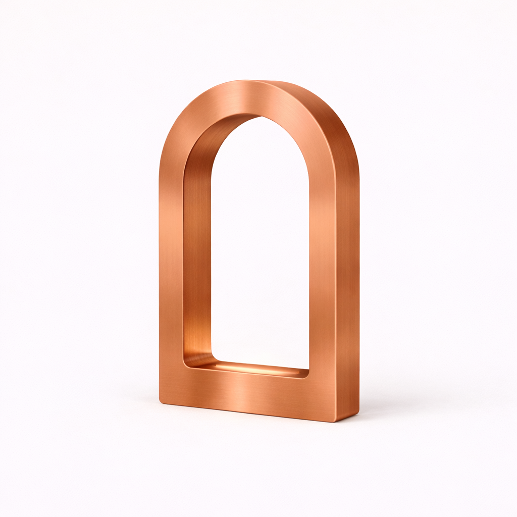 Copper finish U-shaped desk lamp by WOOM with a brushed texture on a white background.