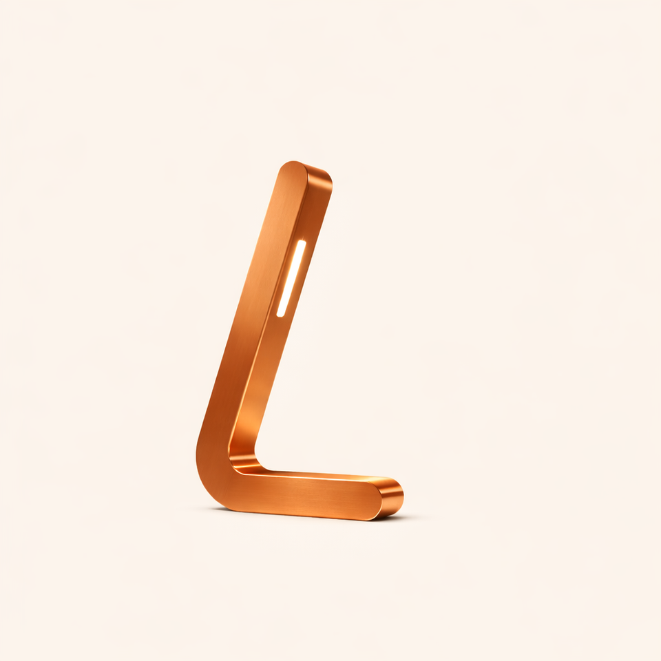 L-shaped wooden lamp with a copper finish by WOOM, featuring a glowing vertical light and rounded design.