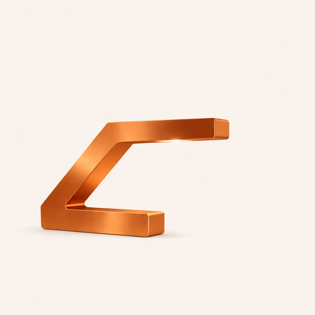 Z-shaped lamp with a brushed copper finish by WOOM, featuring an integrated light source on a plain background.