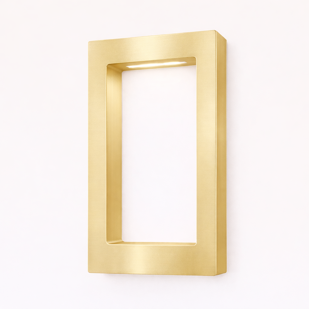 Gold finish rectangular lamp by WOOM, featuring a wall-mounted open frame design with internal top lighting.
